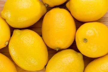 Close-up high-angle view of fresh and juicy lemons