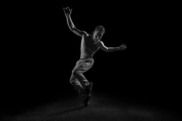 Fototapeta na wymiar Silhouette of dancer in dancing concept