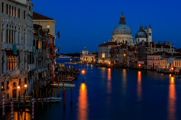 Fototapeta na wymiar Sunset view of the iconic 17th-century Santa Maria di Salute Basilica on the Grand Canal in Venice