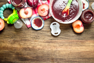 Baby food. Baby puree from fresh plums.