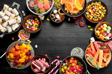 Different sweet candy, jelly and candied in a bowl.