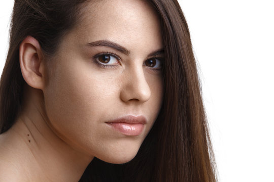 Portrait of beautiful female model on white background