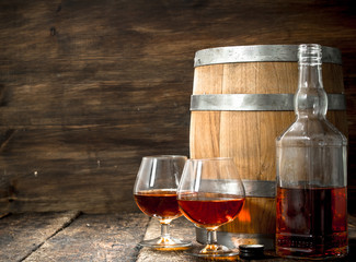 barrel with glasses of French cognac.