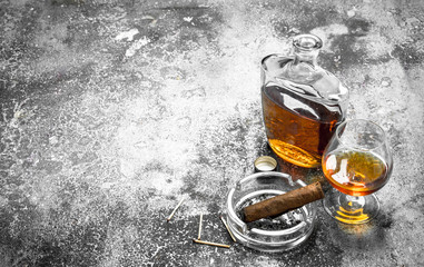 French cognac with a cigar.