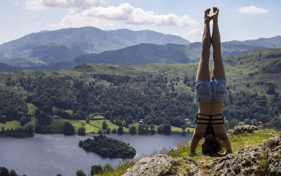 hand stand in the mountain
