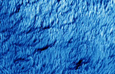 Soft fur textile in navy blue.