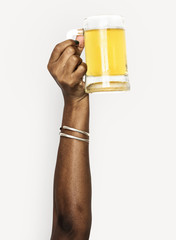 Hand raised holding a beer mug