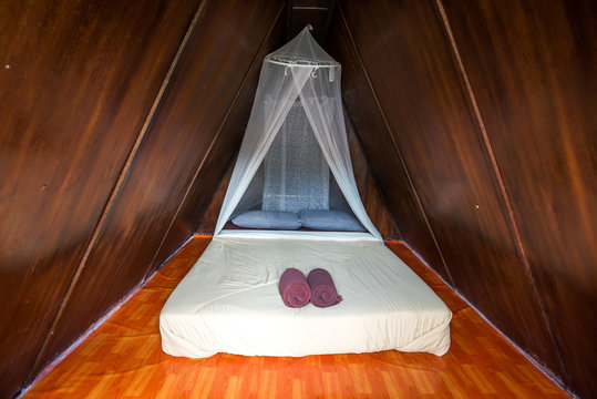 Bed Inside The Tent With Net For Prevent Mosquito As A Bedroom In Contryside, Thailand Tradition