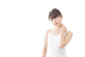 肩こり・関節痛に悩む女性