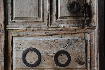 The Door of Church of the Holy Sepulchre in the Christian Quarter of the Old City of Jerusalem, Israel.