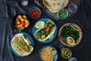 Vegetarian pita with variety dip, top view. Healthy vegetarian food