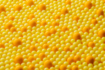 Yellow pills capsules. Medicine and pharmacy concept.