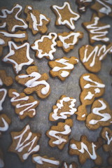 Vanilla cookies on white baking paper sheet.