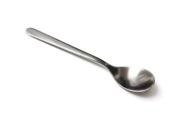Stainless steel spoon isolated on white