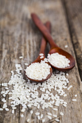 Raw rice and two spoons