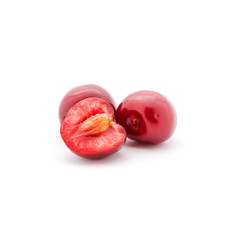 Photo of red cherries isolated on white background