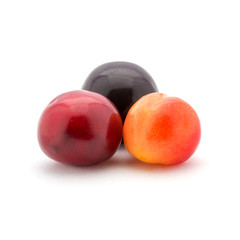 Photo of different red cherries isolated on white background