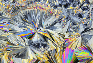 Microscopic view of sucrose crystals in polarized light