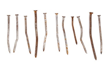 Pile of old, rusty metal nails isolated on white background, top view
