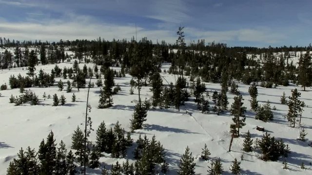 Aerial flyover frozen mountain landscape in Colorado