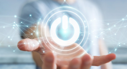 Businessman using 3D render power button with connections