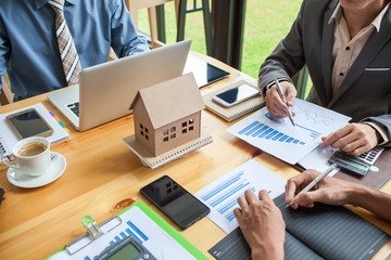 Business meeting of real estate broker, Business meeting working with new startup project. Idea...