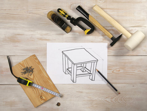 sketch furniture on a white sheet of paper, the top view
