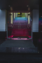 Stairs in the business center. with multi-colored illumination