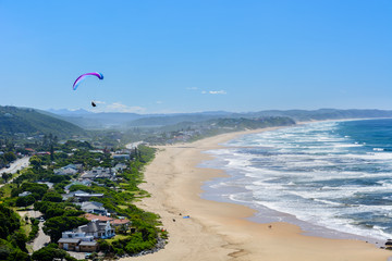 Paragliding over Wilderness beach on the Garden Route, South Africa