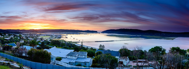 A ultra wide panorama of Knysna lagoon at sunrise, South Africa