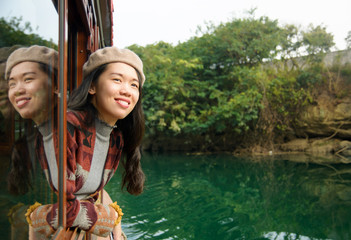 Girl enjoying the ride on a tourist boat