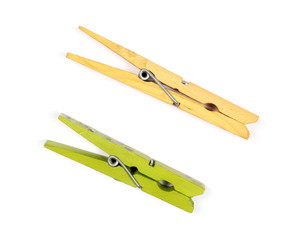 Wooden green and brown clothespins set, natural bamboo peg isolated on white background