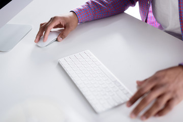 cropped image of african american man using computer