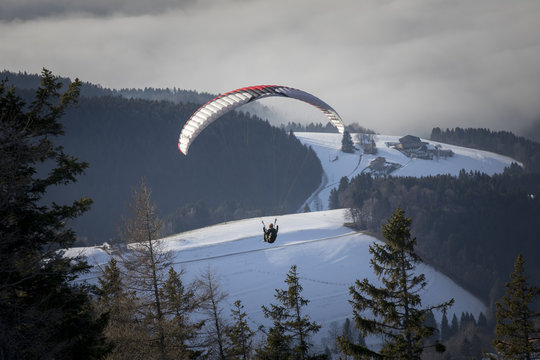 paragliding from mountain schoeckl in styria, austria