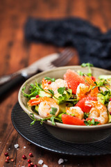 Delicious fresh salad with prawns, grapefruit, avocado, cucumber