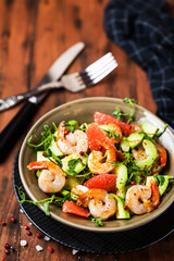 Delicious fresh salad with prawns, grapefruit, avocado, cucumber