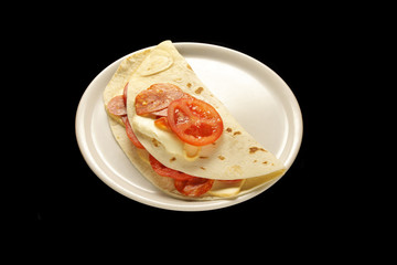 piadina with salami, tomatoes and cheese
