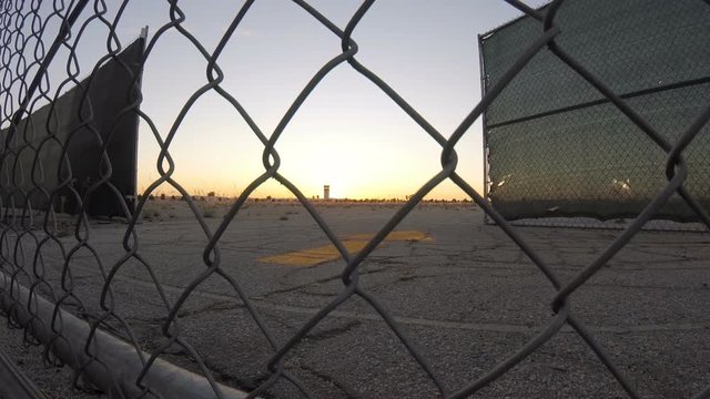 Time Lapse Slider Of Airport Behind Chainlink Fence At Hollywood Burbank Airport