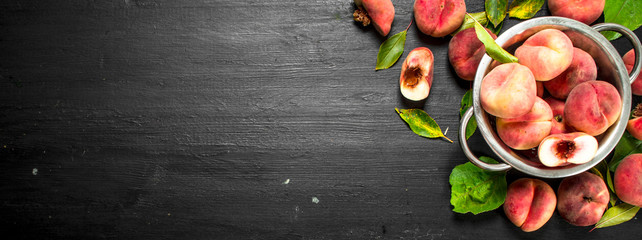 Fresh peaches in a bowl.