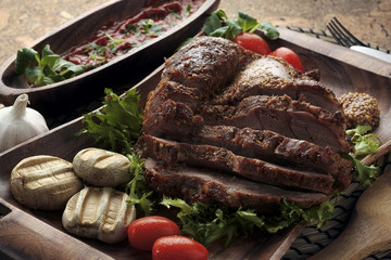 Assorted delicious grilled meat with vegetable over the coals on a barbecue