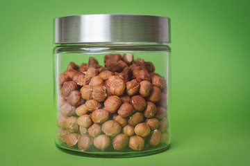 Hazelnuts in glass jar