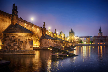 Fototapeta na wymiar It's evening in the city of Prague. View of the Charles bridge. Czech Republic.