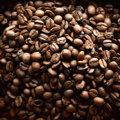 Roasted coffee beans backgound, copy space, top view. Cappuccino, dark espresso, aroma black caffeine drink, ingredient for coffee beverage. Square crop