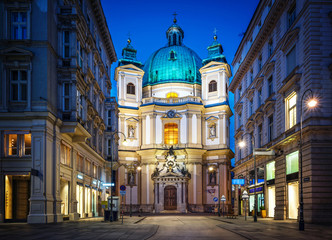 Fototapeta na wymiar View of the evening Saint Peter church, in the historic center of the city. Vienna, Austria.