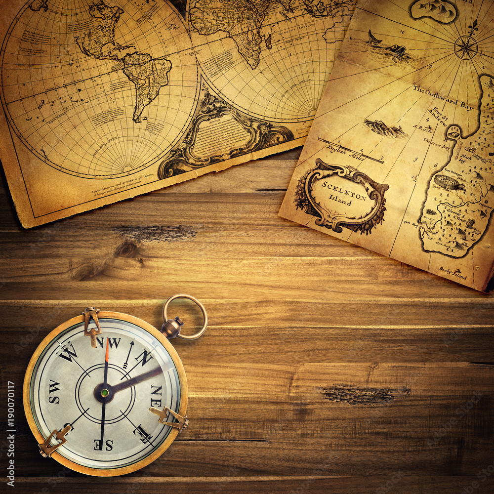 Poster old vintage retro compass on ancient map background. travel geography navigation concept background.