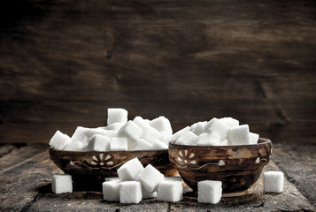 Cubes of sugar in a bowl.