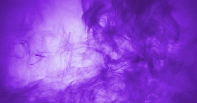 purple paint floating in water like smoke cloud