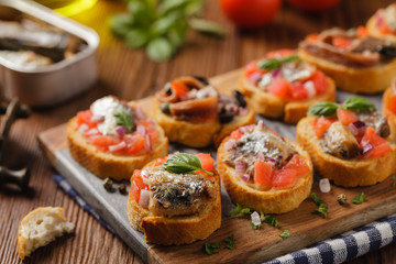 Mix Bruschetta with sardines and anchovies.