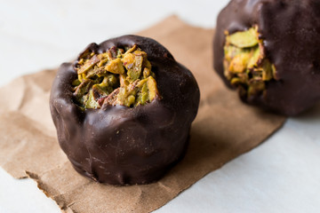 Chocolate Balls with Pistachio Pieces.