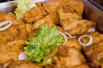 Pieces of white fish, fried in breadcrumbs